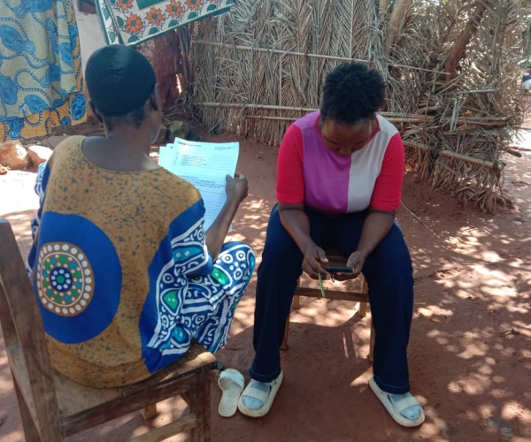 One of our Research Assistants is with a respondent during a consenting session